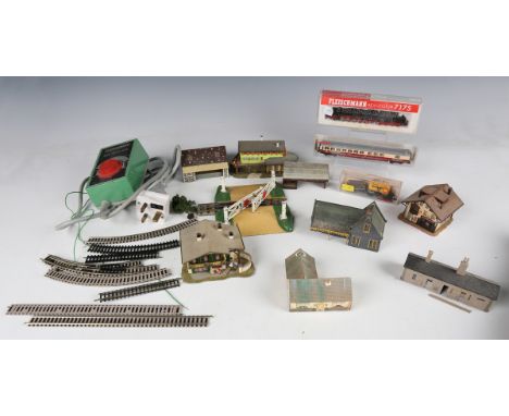 A Fleischmann Piccolo gauge N No. 7175 locomotive and tender, boxed, a restaurant car, boxed, a tank locomotive, a coach, goo