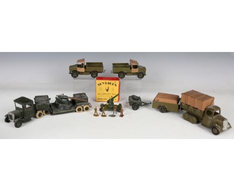 A small collection of Britains army vehicles, comprising underslung heavy duty lorry, two Beetle lorries, half-track covered 