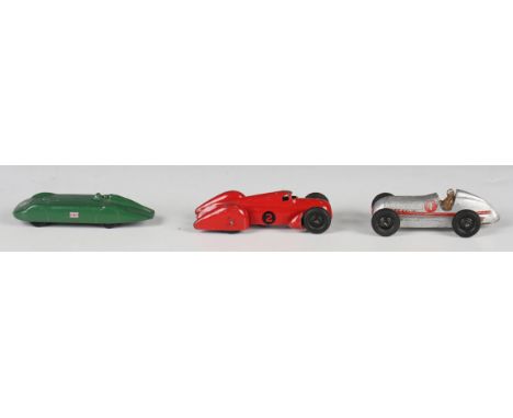 A Dinky Toys No. 23d Auto Union, a No. 23p MG record car and a No. 23c Mercedes-Benz racing car (paint chips). Provenance: fr