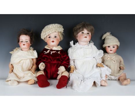 Five Armand Marseille bisque head dolls, all with later wigs, sleeping eyes, open mouths showing upper teeth and bent limb co