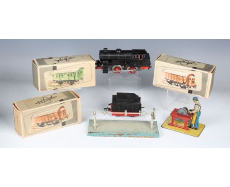 A small collection of Fleischmann gauge O railway items, comprising 0-4-0 electric tank locomotive, two coaches, luggage van,