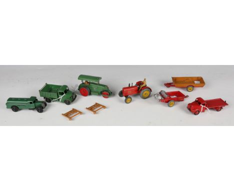 A small collection of Dinky Toys vehicles, comprising No. 25d petrol tanker, No. 25m Bedford tipper, Fordson flatbed lorry, A