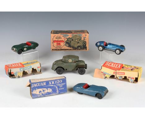 Three Scalex keyless clockwork cars, comprising Jaguar, Jaguar XK120 and 4.5 litre Ferrari, together with a Minic armoured ca