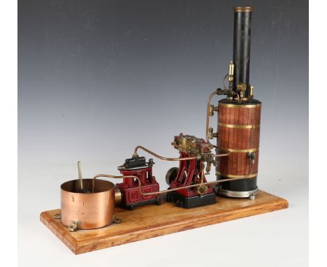 A live steam power plant with Stuart D10 vertical engine with 5cm flywheel and Stuart Turner steam engine, mounted on a woode