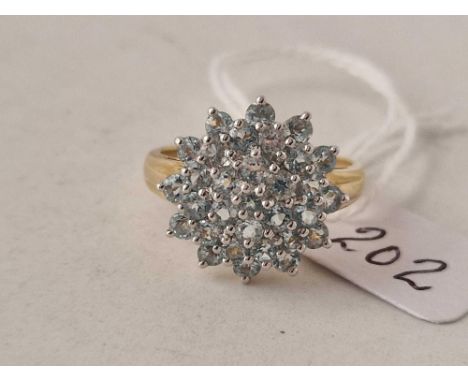 A matching multi white stone ring 18mm diameter 9ct size S 3.4 gms