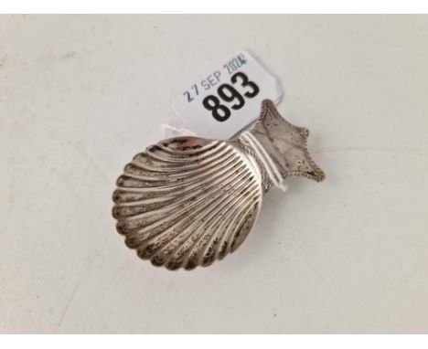 An unmarked Georgian caddy spoon with shell bowl