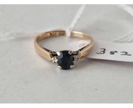 A three stone sapphire and diamond ring 14ct gold size N 2 gms