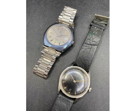 A black dial ZENITH wrist watch and another example