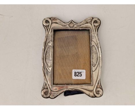 An Art Nouveau photo frame with embossed decoration, 7" high, Birmingham 1906