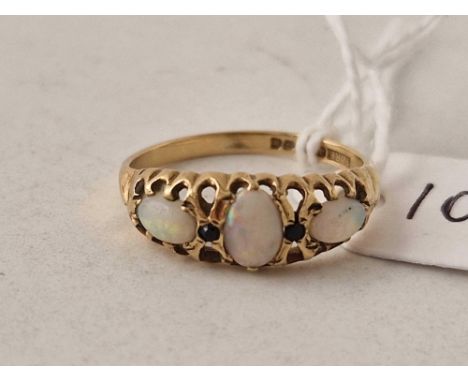 A opal three stone ring 9ct size N 1.5 gms