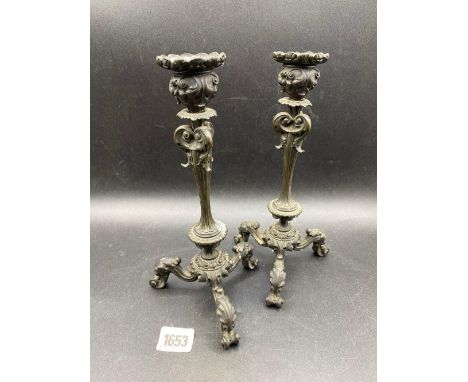 Pair of decorative bronze candlesticks on tripod base, 10" high