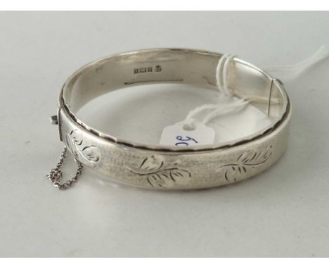 A hinged silver bangle 19 gms