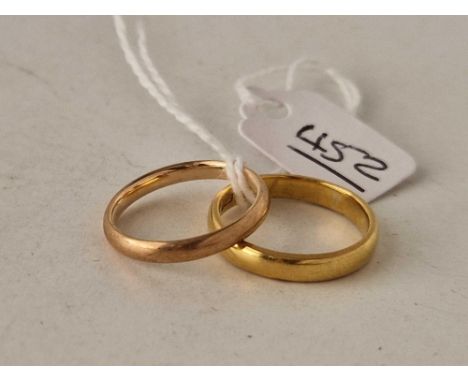 A 22ct gold wedding band size L    3.4 gms together with a 9ct wedding band size K    1.5 gms