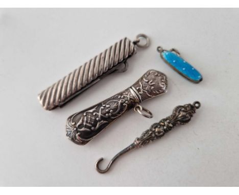 Three silver button hooks etc.