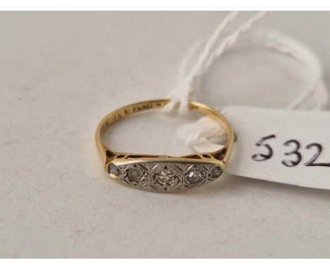 A antique three stone diamond ring in 18ct gold and platinum size H