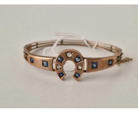 A ANTIQUE HORSE SHOE SAPPHIRE AND DIAMOND BANGLE 9CT