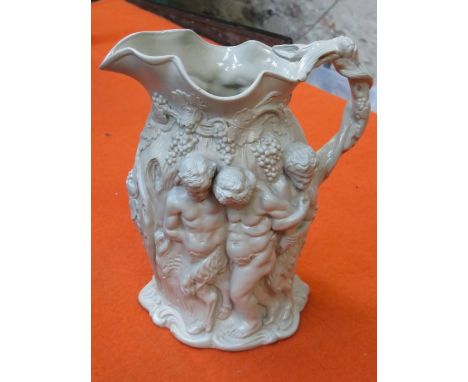 VICTORIAN RELIEF DECORATED CERAMIC WATER JUG, APPROXIMATELY 23cm HIGH