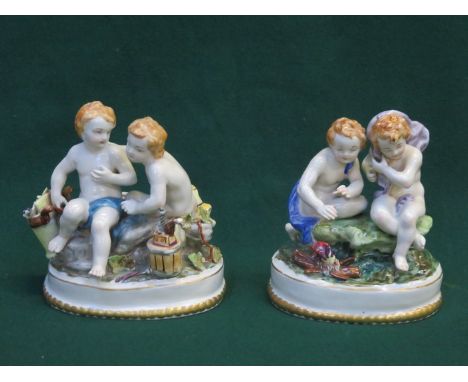 PAIR OF CONTINENTAL STYLE GLAZED CERAMIC FIGURE GROUPS 