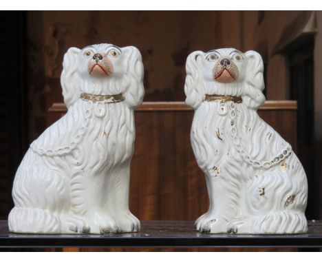 PAIR OF CERAMIC STAFFORDSHIRE SPANIELS 