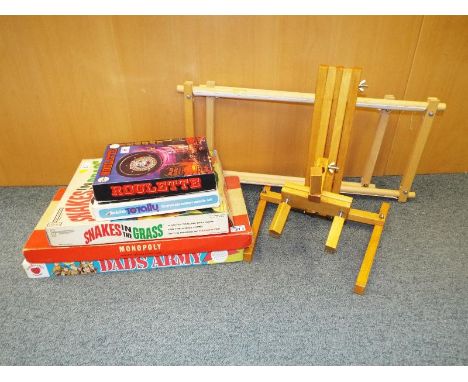 A collection of vintage board games and an artists wooden easel (qty)