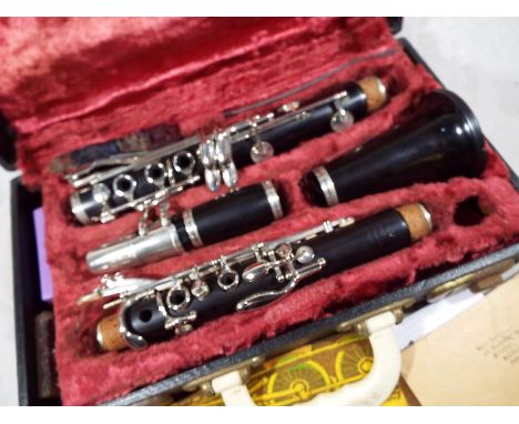 A Rudall, Cart & Co Ltd clarinet, Romilly model, - 204466, with reeds and fitted hard case - estimate £40 - £60