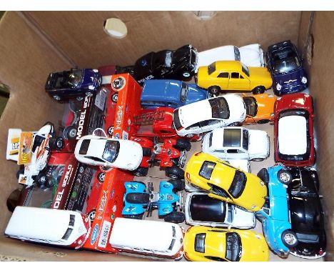 A collection of diecast model motor vehicles to include two World Fangle quad bike models, mint in box, two Welly Nex models,