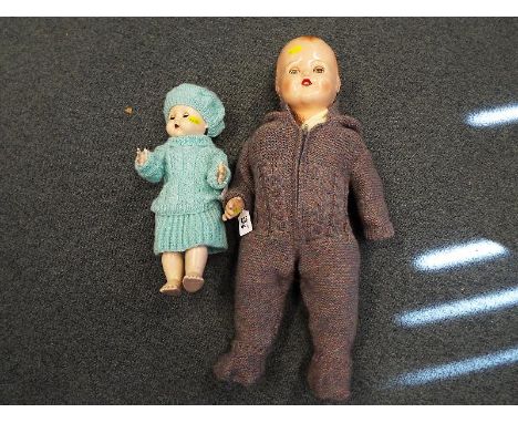 Two vintage dolls comprising a Pedigree doll with jointed limbs and sleeping eyes, marked 16T and one other with jointed limb