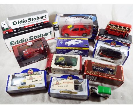 A collection of diecast model motor vehicles to include an Eddie Stobart Volvo FH Fridge Trailer, Emma Jade H4463, a London T
