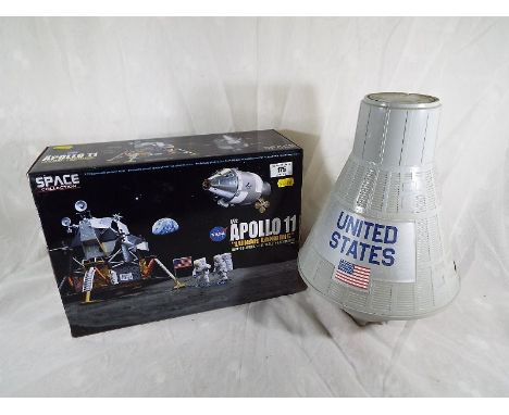 A vintage Action Man space capsule, a G I Joe Classic Collection Mercury action figure with box, a space collection Nasa Apol