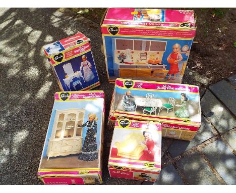 A quantity of vintage Sindy items to include Sindy Dining table & chairs, China Cabinet, Action Kitchen, Dressing table & sto