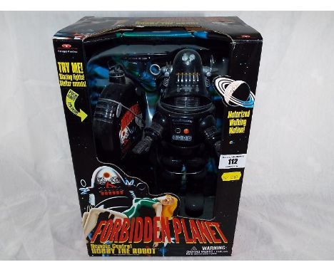 Forbidden Planet - A Forbidden Planet remote control Robby The Robot with walking motion, lights and sounds, near mint in box