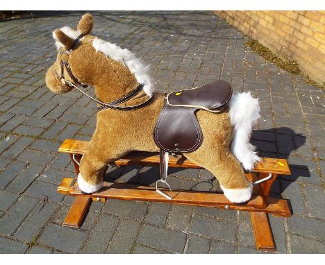 A Rocking Horse by Mamas and Papas, 90 cm (high)  