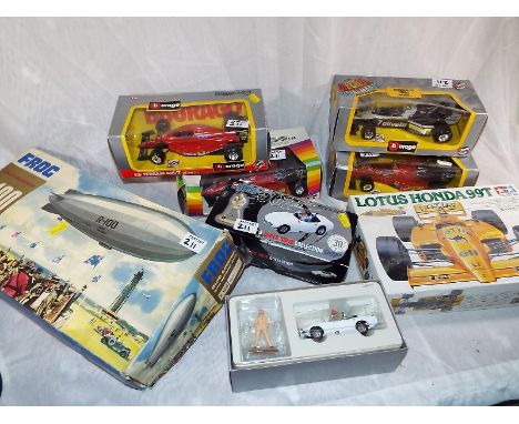 A collection of diecast motor model vehicles to include Corgi classics, James Bond  collection 007 boxed, a Burago 1/24 scale