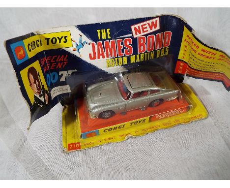 Corgi Toys, The New James Bond Aston Martin DB5, #.270, in presentation bubble pack with wing flaps, bubble still sealed, Top