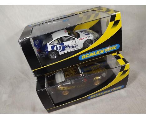 Two Scalextric model racing sports cars, mint in box