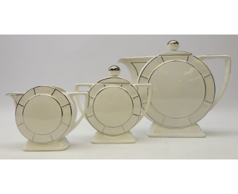 French 1930s three piece tea ceramic set by Digoin Sarreguemes, circular form with silvered lustre highlights, numbered 9030 