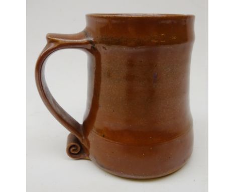 Bernard Leach (British 1887 - 1979): Mid century Tenmoku glaze tankard with scroll handle, H12cm Condition Report Click here 