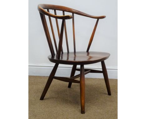 Ercol medium elm cow horn armchair, stick back, turned supports joined by stretcher, W54cm  Condition Report Click here for f