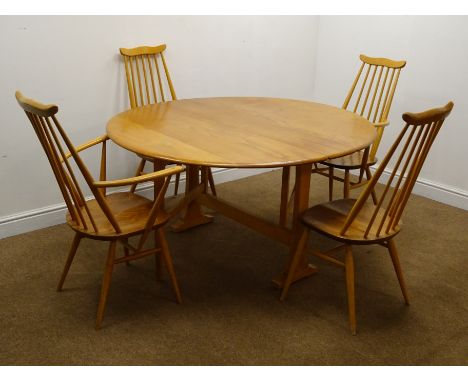 Set four (2+2) Ercol stick back dining chairs, elm seat, turned supports (W63cm) and a drop leaf gate leg table (W128cm, H72c