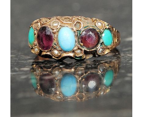 A 19th century 9ct gold amethyst and turquoise set ladies ring. Set within scolled shank hallmarked to the centre. Total weig