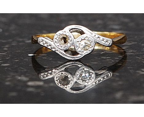 An 18ct gold and diamond ring having swirl mount inset 2pnt diamond with one diamond missing, Total weight 1.4g Size K

FREE 