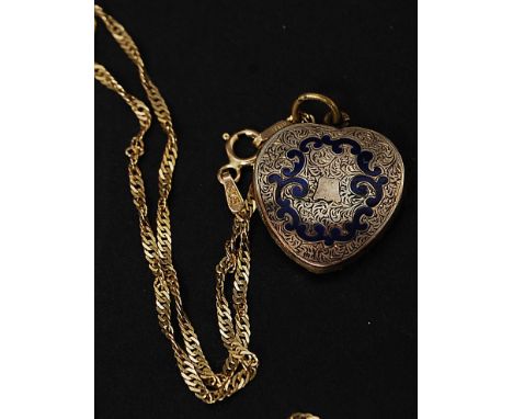 An Italian 9ct gold necklace with a yellow metal and silver enamel set hair locket. Total weight 4.5g.

FREE UK POSTAGE ON AL