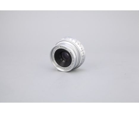 M mount, chrome, serial no. 1273258, body, VG, elements, VG, some light internal haze, with maker's bubble