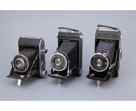 including a Zeiss Ikonta 520/2 C, Ensign Selfix 220, and a Kodak Volenda 620 camera