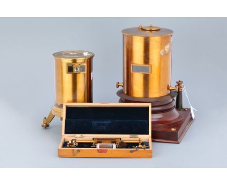 The galvanometer on large turned French polished wooden base with brass terminals, with lacquered brass cover engraved 'SULIV