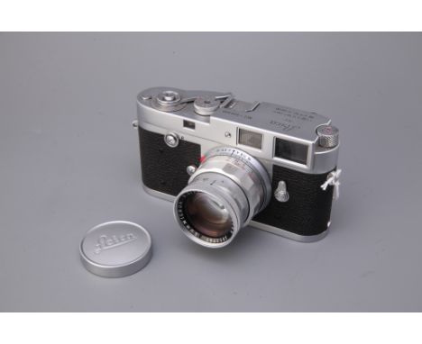 chrome, serial no. 929500, with Leitz Summicron f/2 50mm lens, chrome, serial no. 2052797, body, G-VG, shutter working, lens,