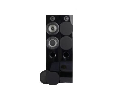 black, with two bass drivers and tweeter, complete with Chord speaker cable