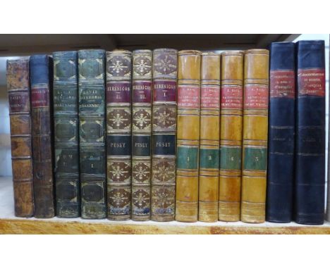 Shelf of leather bound books, including Eirenicon, Commentarius in sancta Evangelia, La Theologie Affective ou St. Thomas en 
