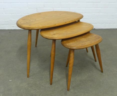 Ercol nest of three Pebble tables,  light elm, 76 x 41 x 45cm. (3)
