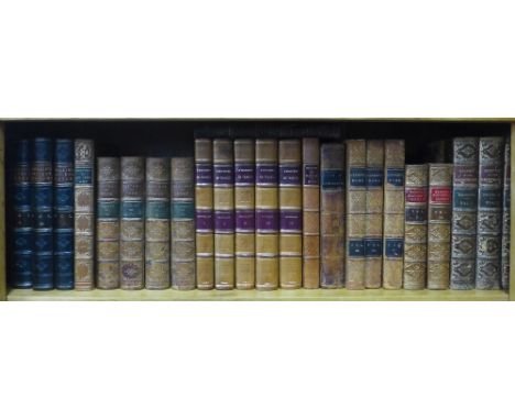 Shelf of leather bound history books, including L'Histoire De France, Mommsen's History of Rome, Rollin's Ancient History, Hi